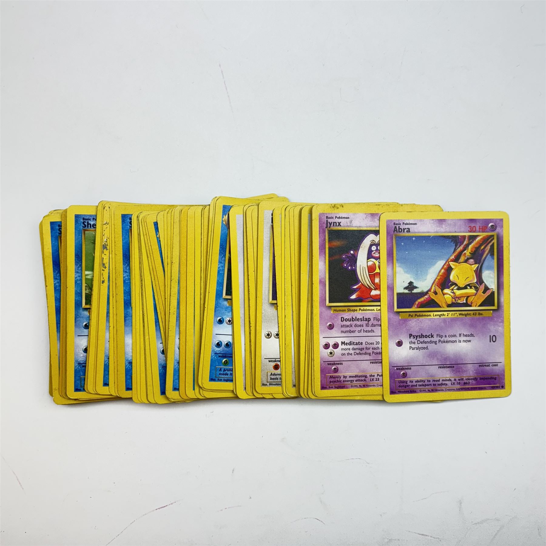 Collection of approximately five hundred vintage Pokemon TCG trading cards, mostly 1999 Wizards examples, including Jungle, Fossil, Team Rocket and Base Set, energy and trainer cards, together with Pokemon collectables including Zapdos 145 Collector Marble Case with eight marbles, Pokemon Gold Version Gameboy game, empty card boxes and Digimon cards