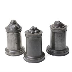 Two Victorian pewter quart ice cream moulds by Benham & Froud in three parts, the lids mou...