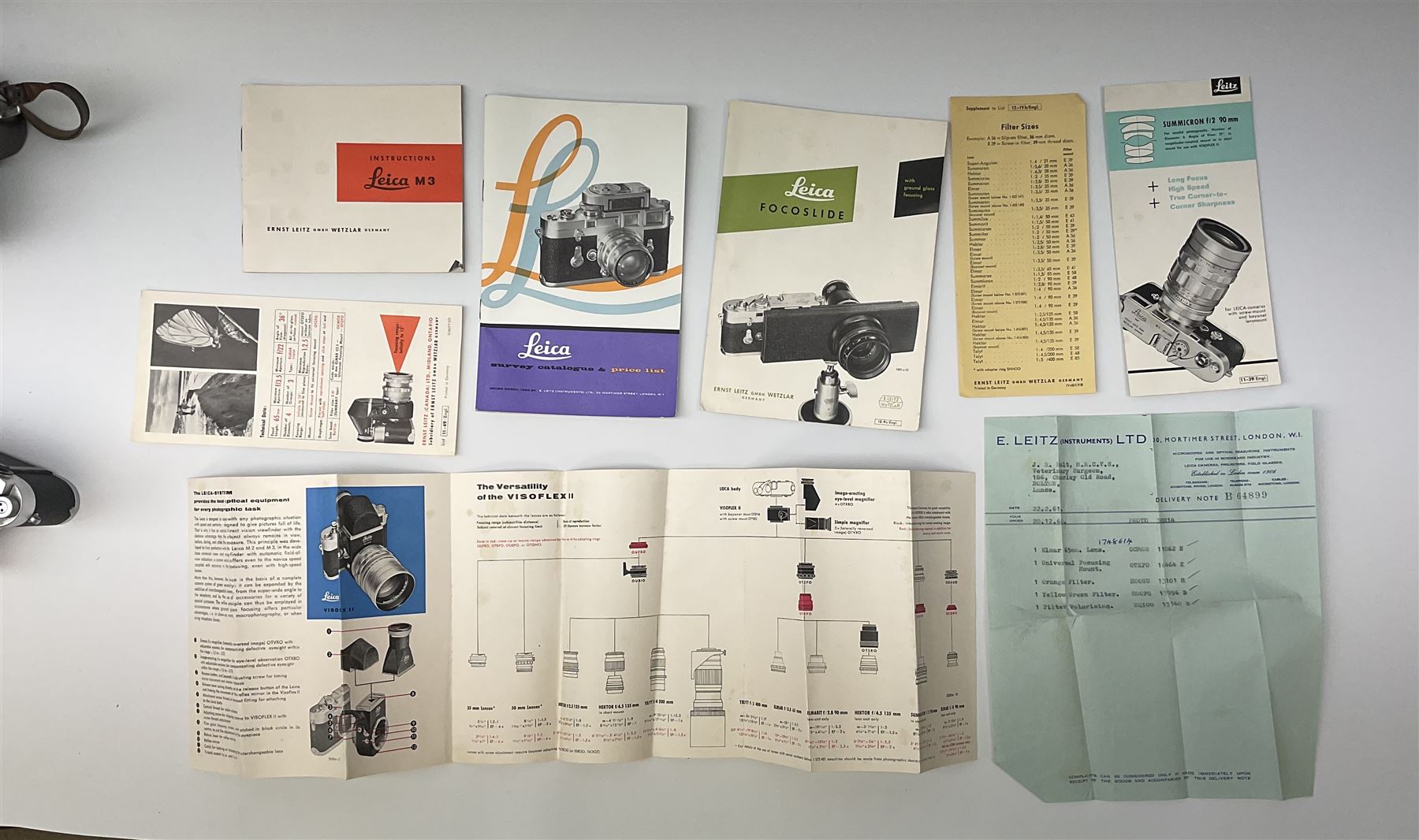 Leica M3 camera body, 1959, chrome finish, serial number '986937', fitted with 'Ernst Leitz GmbH Wetzlar Summicron f=5cm 1:2 Nr.1592614' lens, with Leica M3 instruction booklet