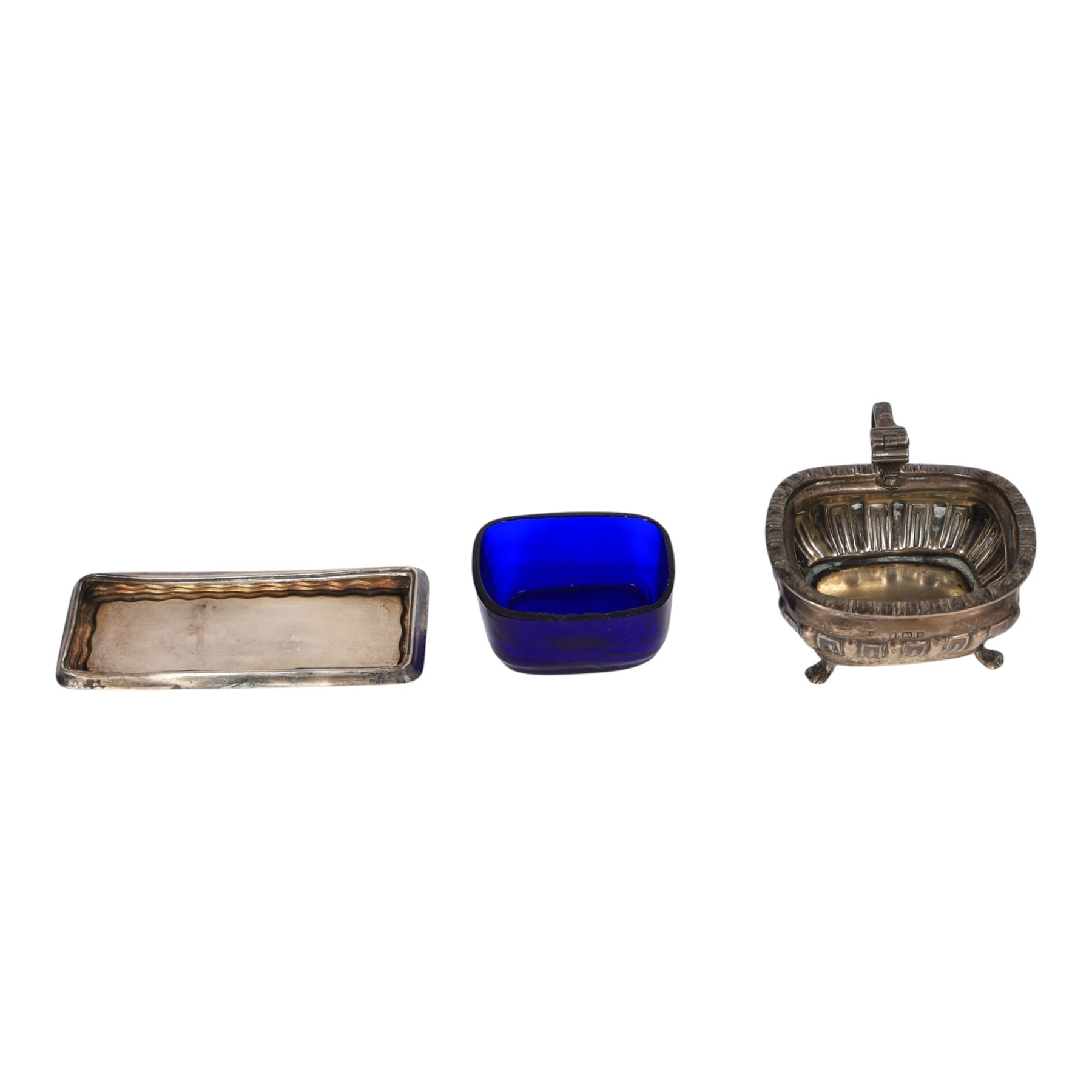 Collection of silver, including pair of silver mounted clothes brushes, cigarette case, mustard pot, pepper shaker, glass jar with silver lid and oval box