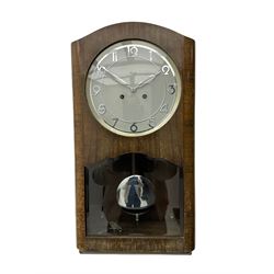 A mid 20th century German wall clock in 