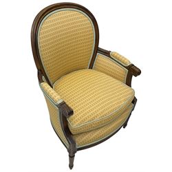 French design hardwood-framed armchair, moulded frame, upholstered in pale orange geometric design fabric, on turned and fluted feet
