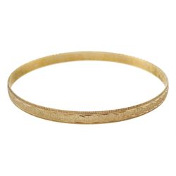 9ct gold bangle, with engraved decoration, hallmarked