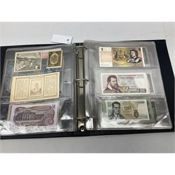 World banknotes, including Queen Elizabeth II The States of Jersey one pound 'DB202703', five pounds 'BB527762' and ten pounds 'AB651481', reserve bank of New Zealand two dollars '1L3 741894', King George V Straits Settlements one dollar 1st January 1935 'F/83 28924', various Bank of England notes etc, housed in two ring binder albums