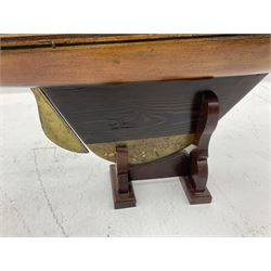 Early 20th century large pond yacht with mahogany hull, stained pine keel with brass rudder, simulated deck hatches and brass fittings, rigged as a staysail schooner (?) with four sails L117cm H148cm; loose mounted on stained pine stand