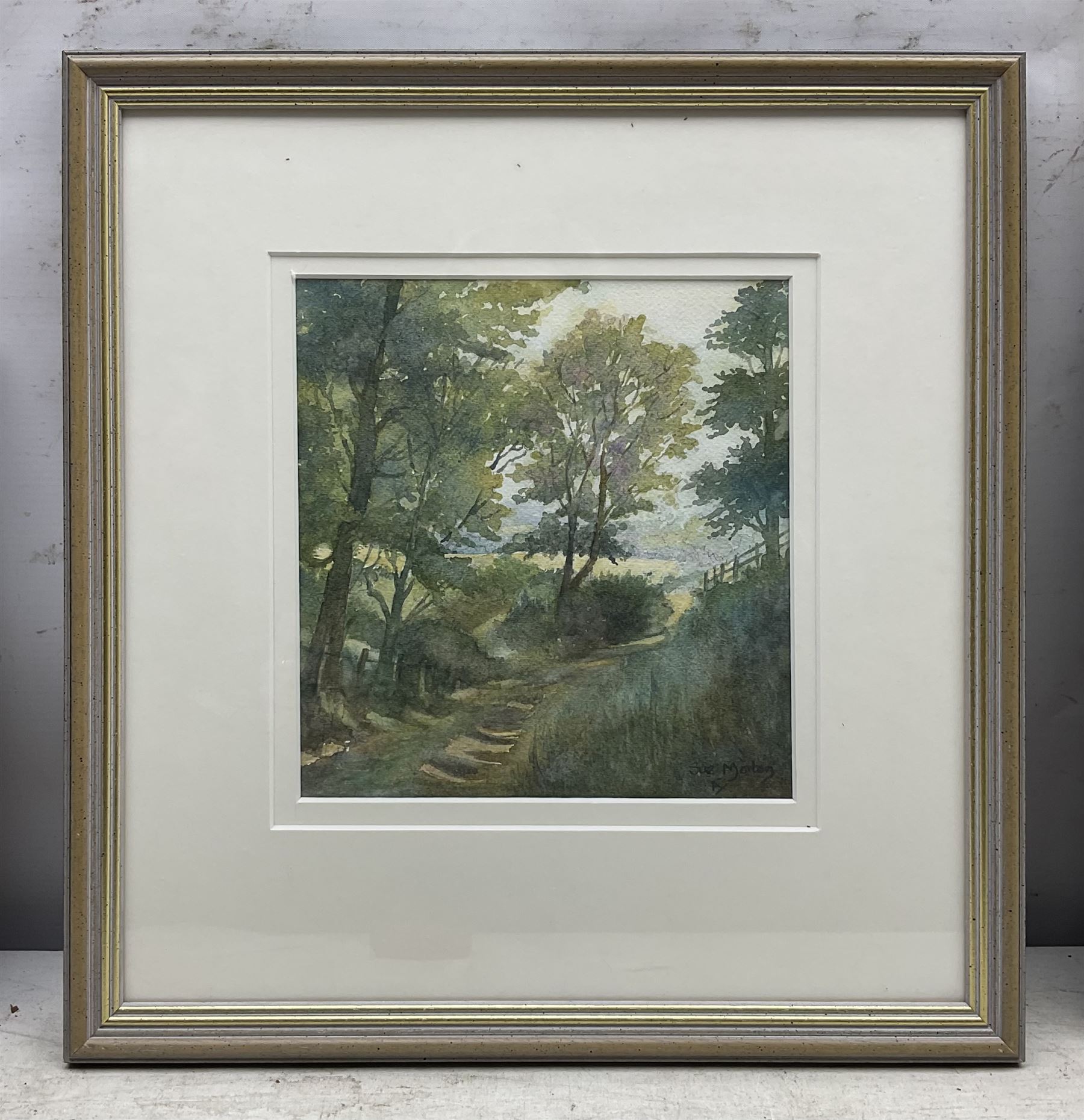 Norma Lindsay (Northern British 20th Century): Whitby Woodland Scenes, three watercolours signed max 33cm x 23cm; Sue Morton (British 20th Century): 'Featherbed Lane - Aislaby', watercolour signed, titled verso 20cm x 19cm (4)
