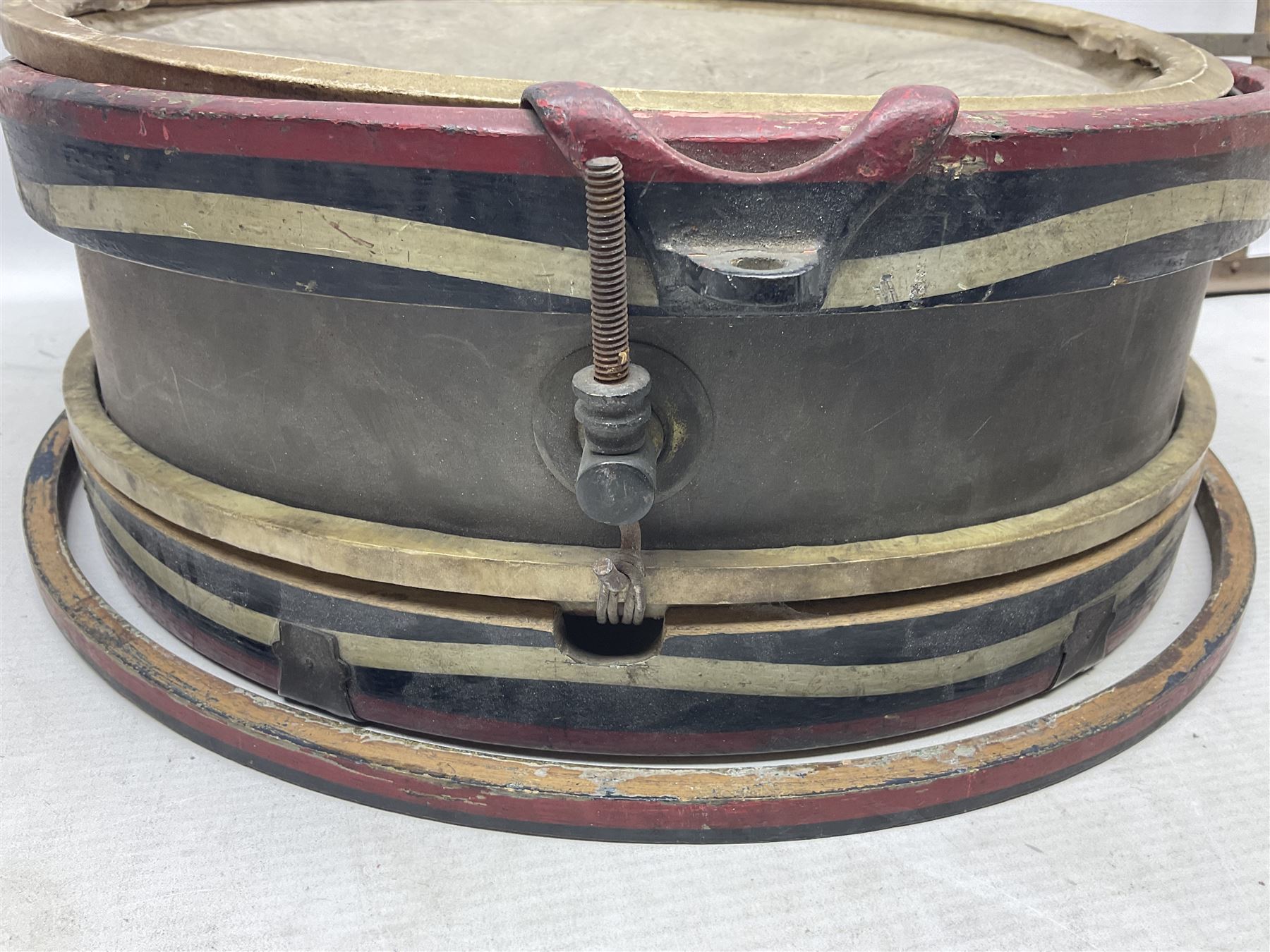 Disassembled early 20th century Boys Brigade snare drum D37cm with copy WW1 period photograph of the Kirbymoorside Boys Brigade; early 20th century hardwood clarinet; bagpipes chanter; and Dulcet E-flat penny whistle