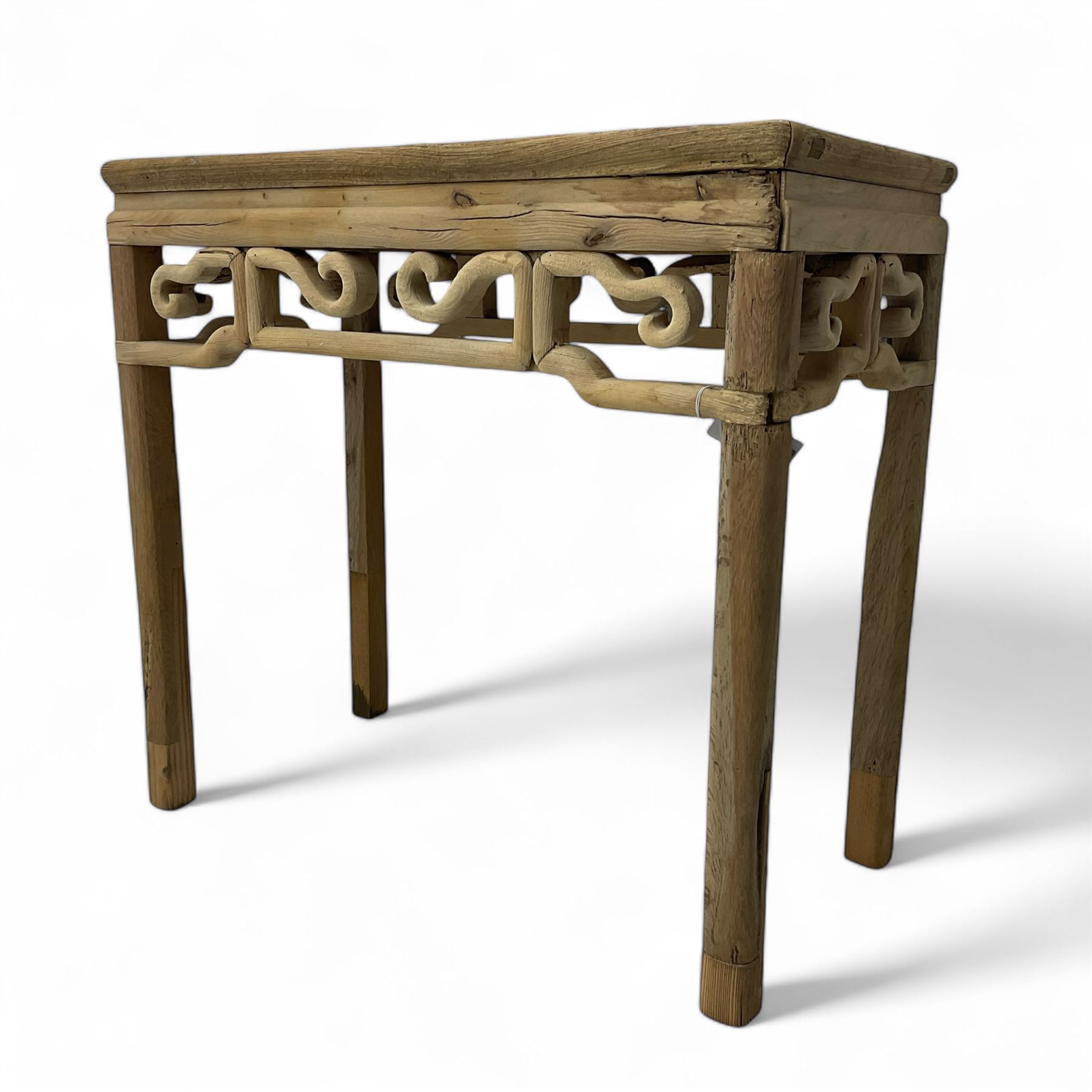 Chinese Ming design elm side table, rectangular top over shaped frieze rails, on square supports with curved outer edge 