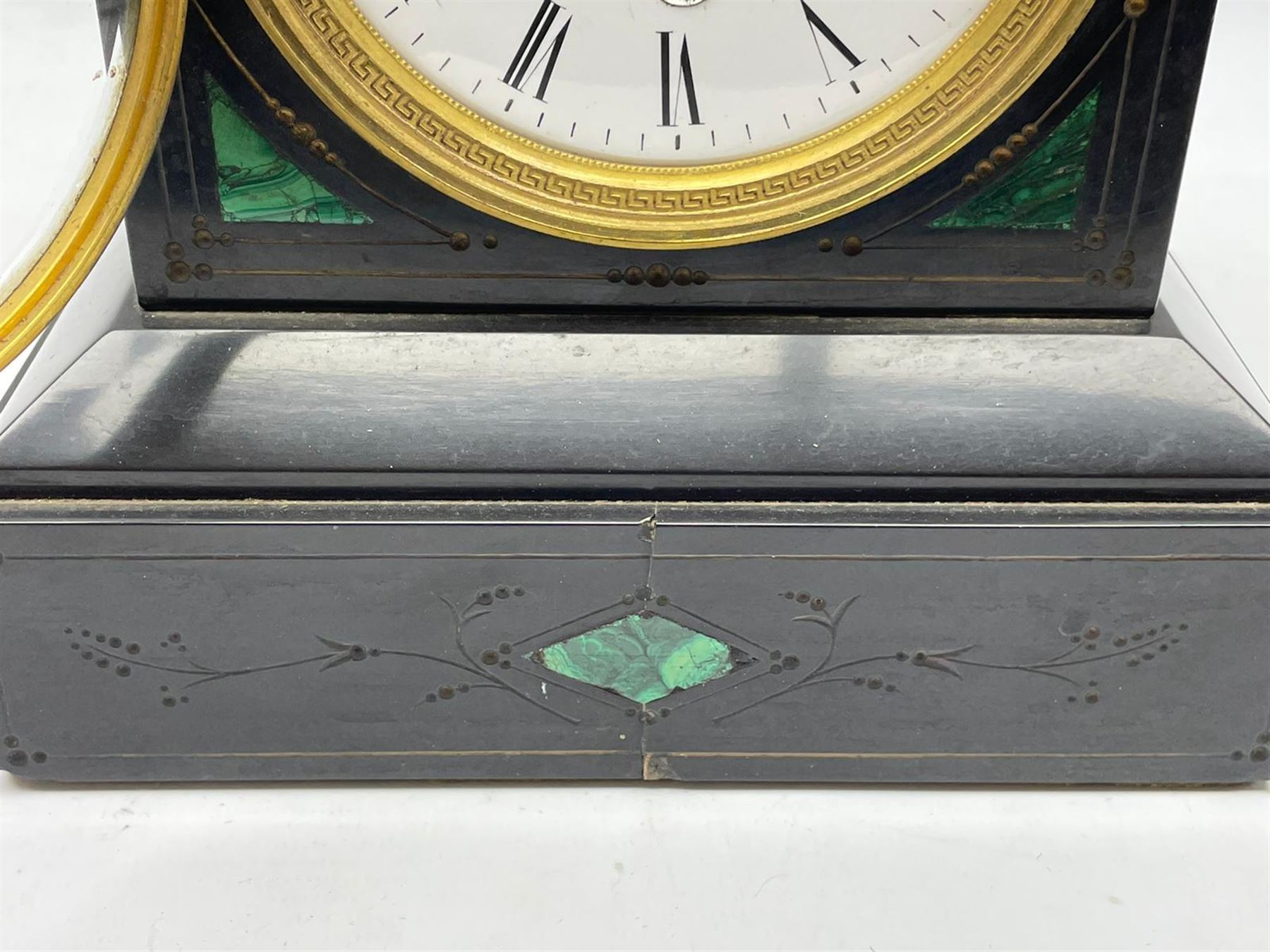 Victorian black slate mantel clock timepiece, the case with engraved and gilt decoration and inlaid with malachite, circular enamel Roman dial, single train driven movement
