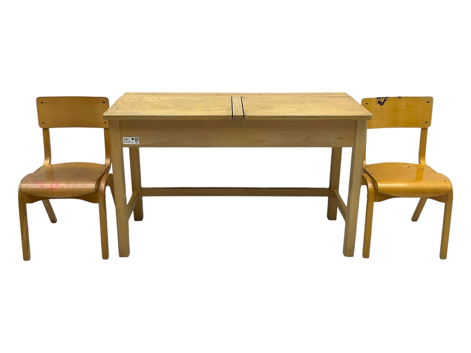 Mid-20th century beechwood school desk, rectangular lift-top desk with storage compartment, supported by square legs with cross stretchers; two matching beech chairs (3)