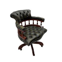 Captain's swivel desk chair, upholstered in studded green leather