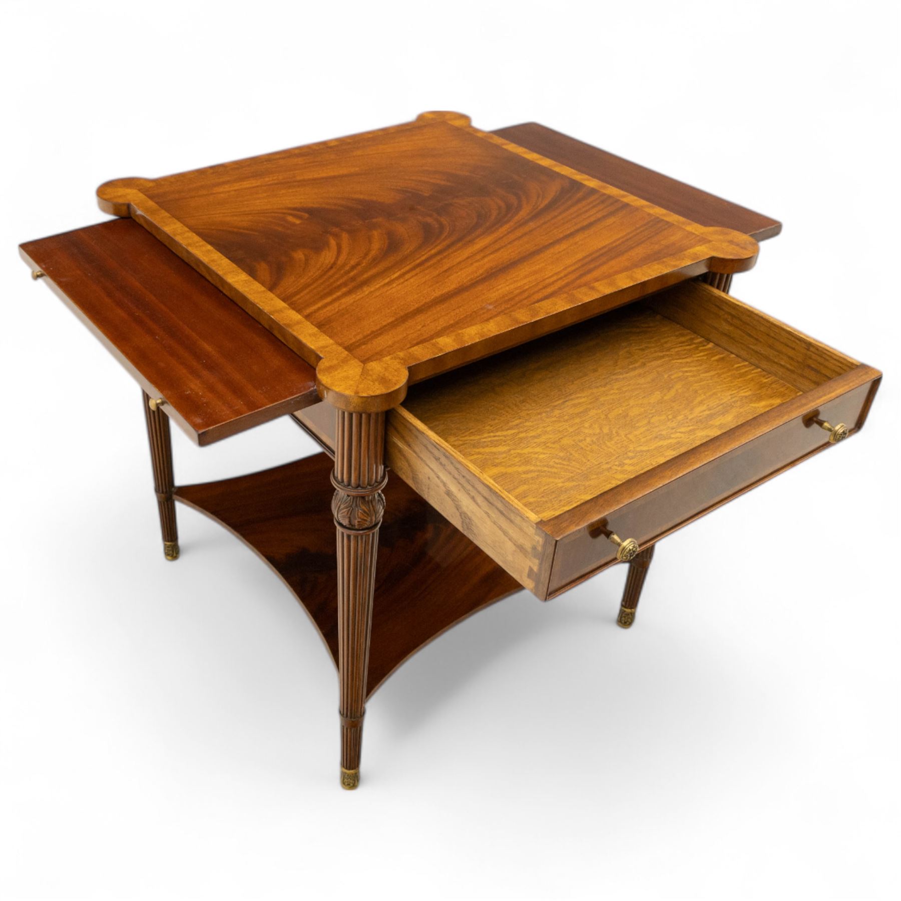 Maitland Smith - Pair of mahogany side tables, the rectangular top with rounded corners, the top edge inlaid with movingui wood, above two under-tier shelves, and frieze drawer, supported on stop-reed and acanthus foliate carved legs united by platform stretcher, raised on brass sabot foot caps