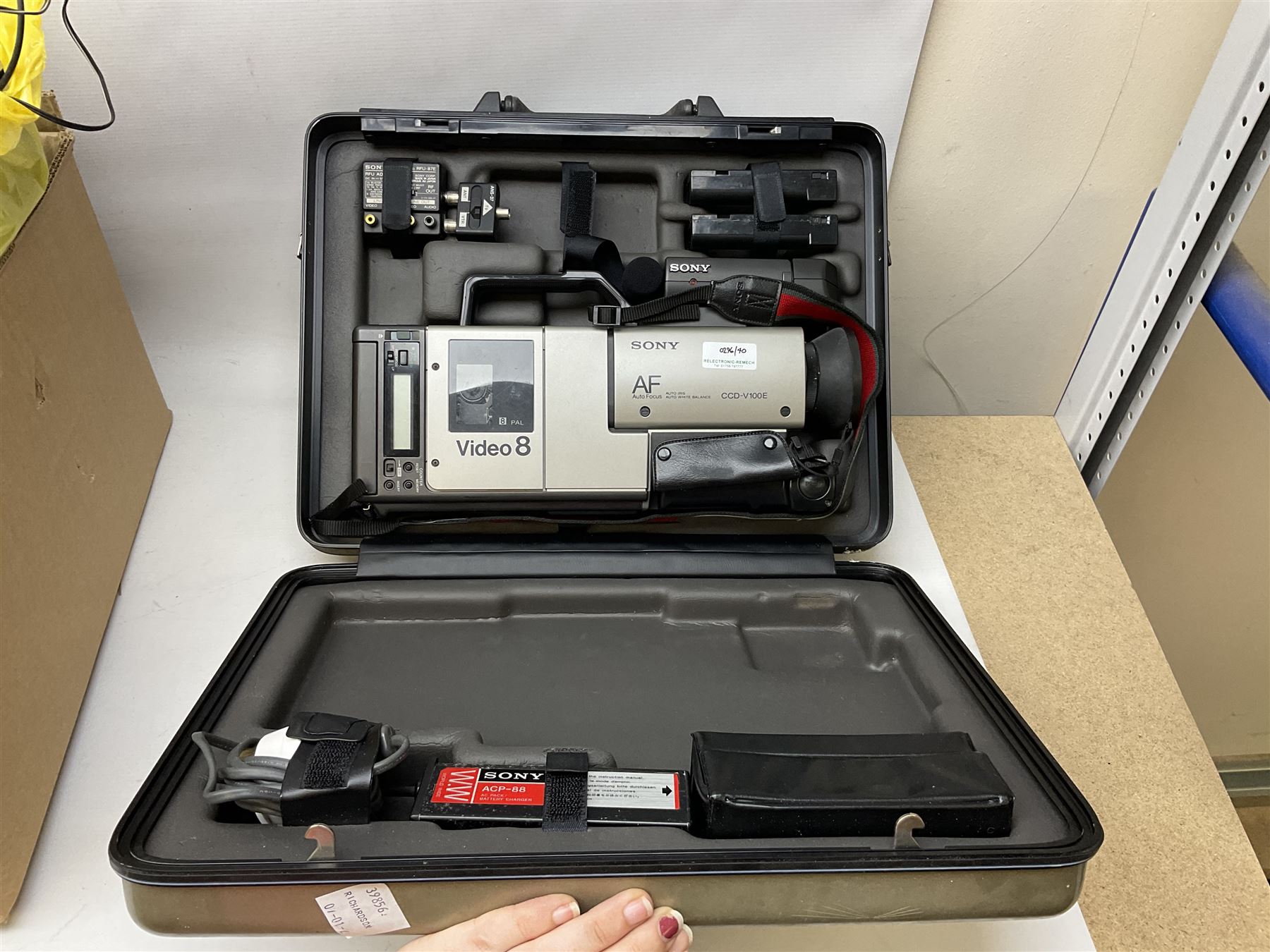 Cased Sony 'Trinicon' HVC-200P video camera, Sony Betamax portable video cassette recorder, cased Sony Video 8 CCD-V100E video camera, Sony SL-F1UB portable video cassette recorder, two Sony AC power adaptors etc