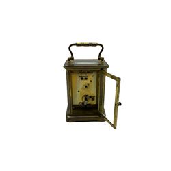 A late 19th century French timepiece carriage clock in a corniche case with a white enamel dial and Roman numerals, minute markers and five-minute Arabic’s, steel spade hands, replacement lever platform escapement, with four bevelled glazed panels to the sides and a rectangular panel to the top of the case. 