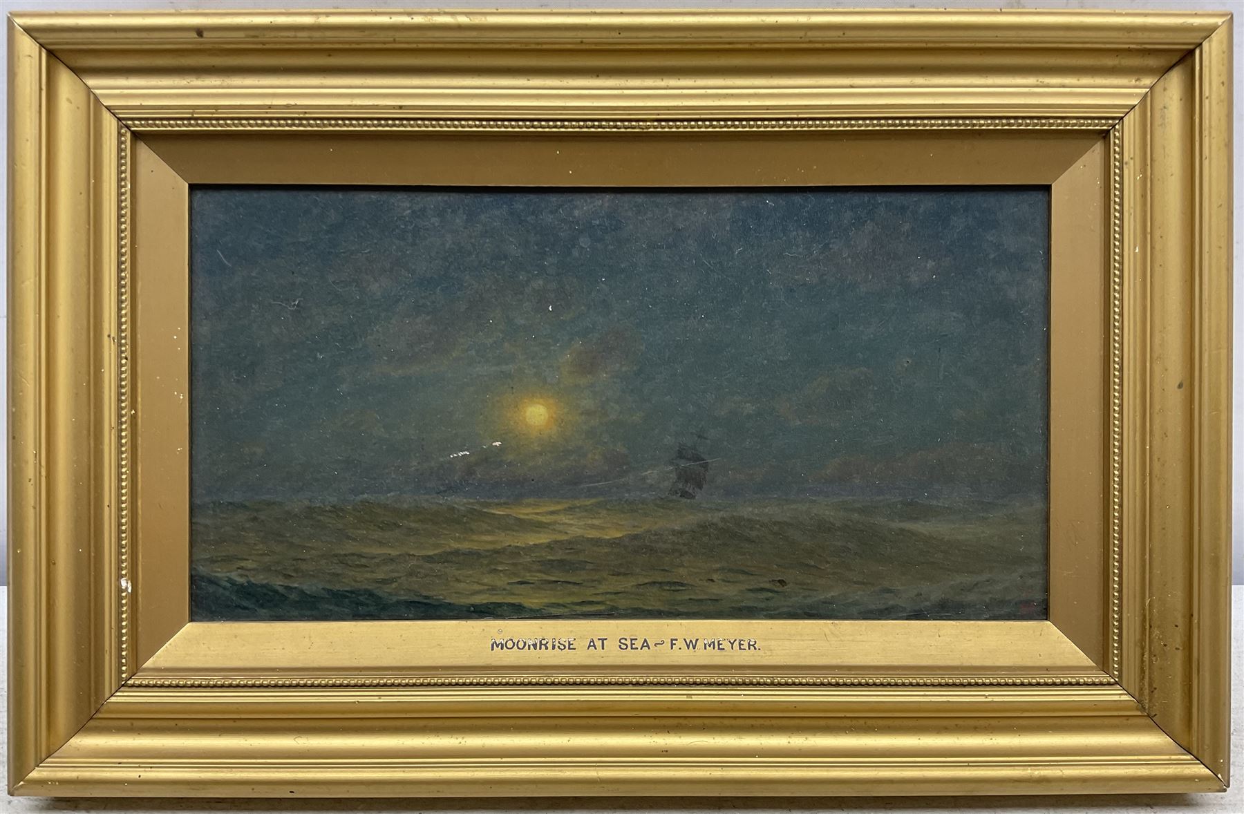 Frederick William Meyer (British 1846-1919): 'Moonrise at Sea', oil on board signed with monogram, titled verso (within the frame) 15cm x 29cm
