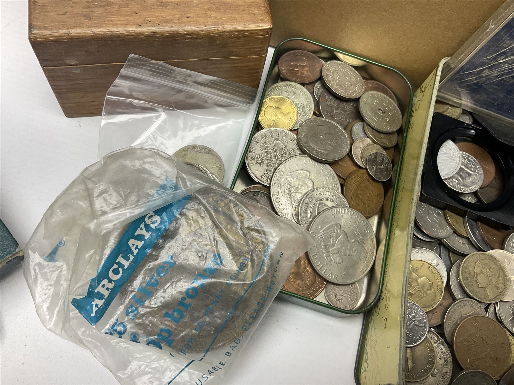 Great British and World coins, including a small number of pre 1920 silver coins, pre-decimal pennies, commemorative crowns, various part filled 'The London Mint Office' commemorative coin folders, Britain's First Decimal Coins sets in blue folders, pre-Euro coinage, United States of America coins etc