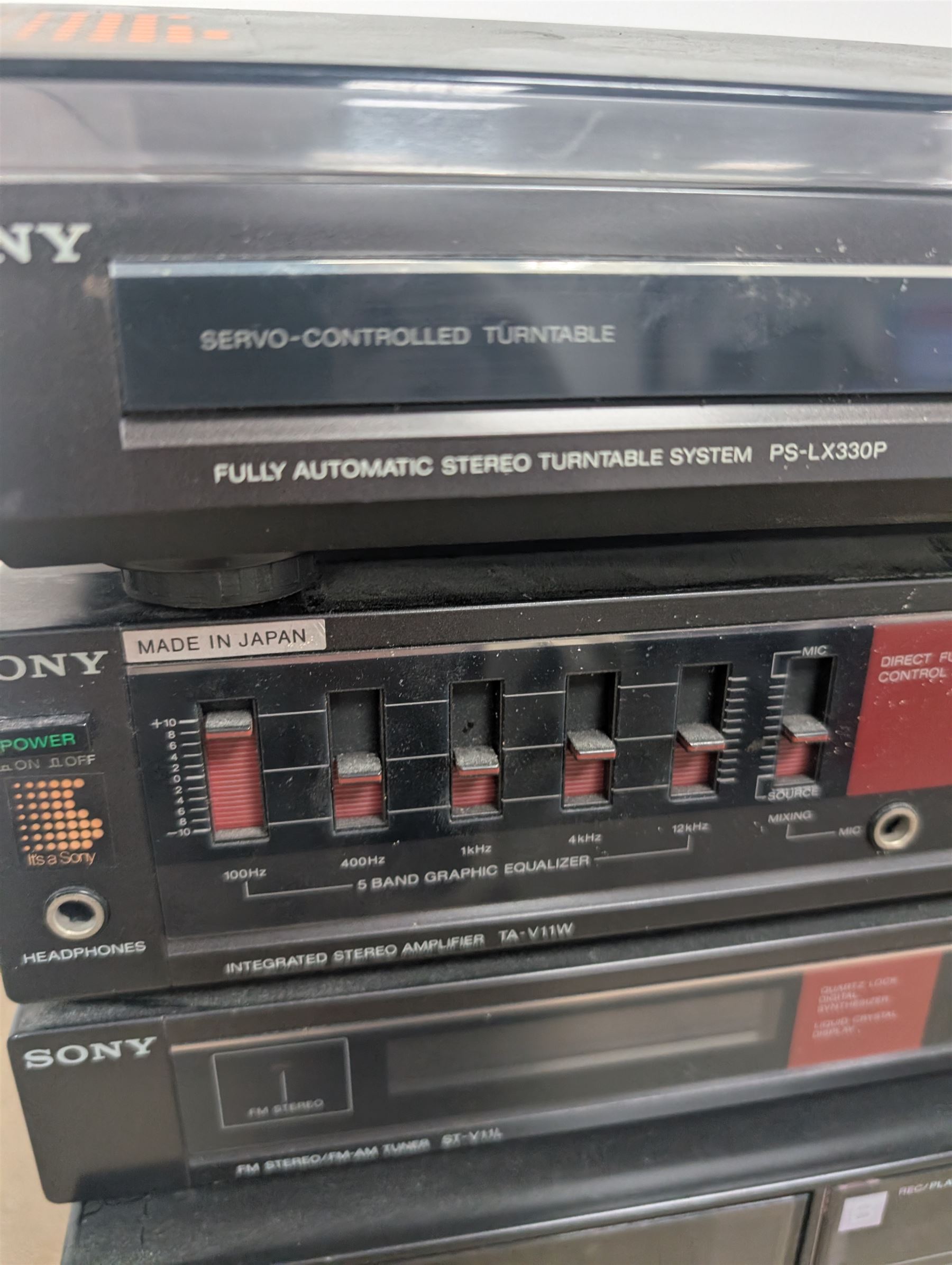 Sony HiFi system, comprising PS-LX330P Turntable, CDP-30 CD Player, TA-V11W Amplifier, ST-V11L FM-AM Tuner, TC-V11W Cassette Player and a pair of SS-V11 16cm 2Way Woofer Speakers