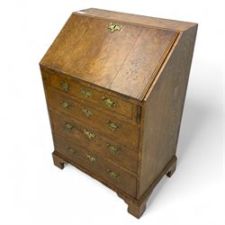 George III figured walnut bureau, fall-front enclosing central cupboard, six pigeonholes and six drawers, fitted with four graduated cockbeaded drawers, on bracket feet