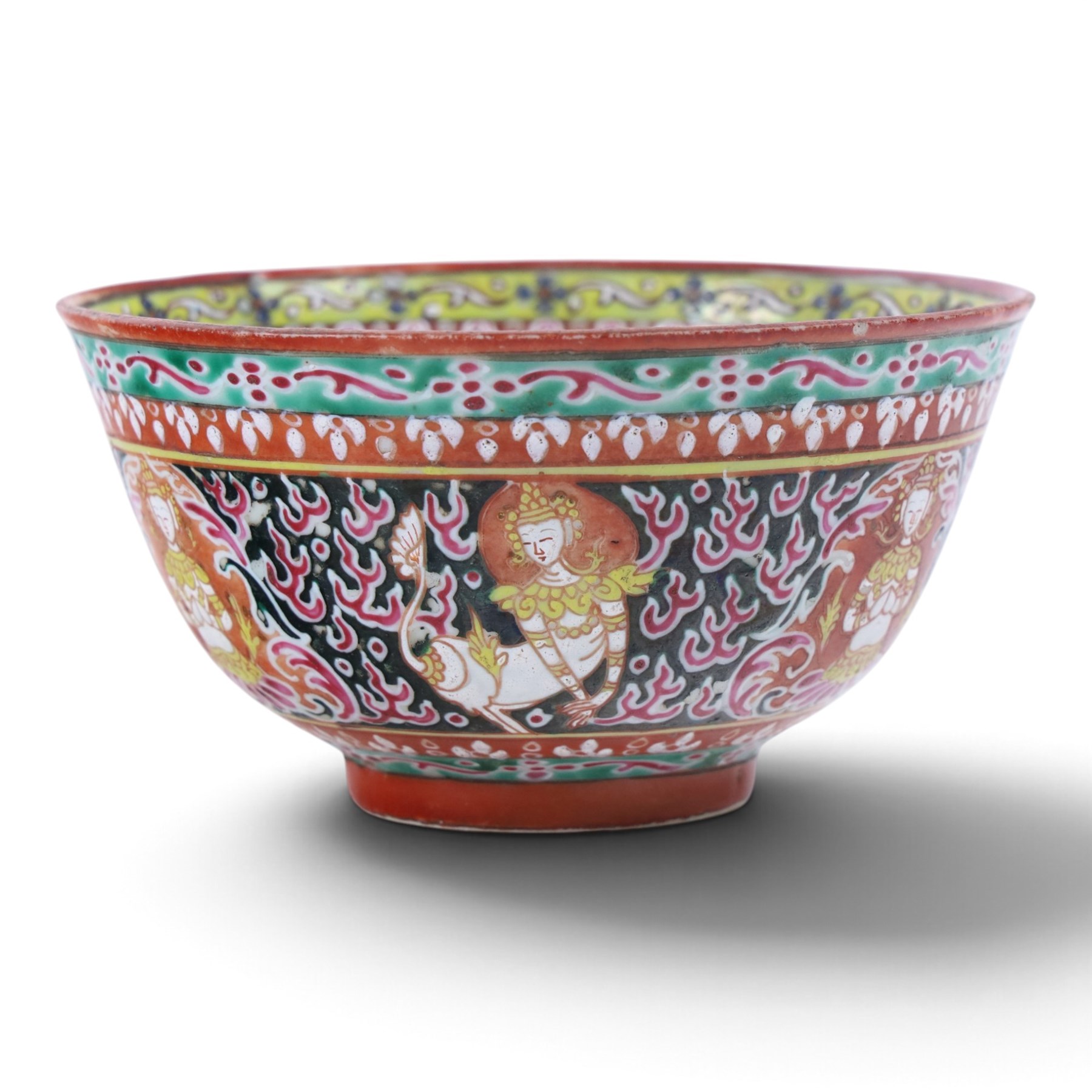 Benjarong bowl, the sides painted with alternating images of the Buddhist figures on a black ground embellished with flames, H8cm D15cm