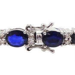 18ct white gold oval cut sapphire and round brilliant cut diamond bracelet, total sapphire weight approx 12.00 carat