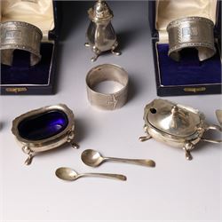 Silver three piece condiment set Birmingham 1938, pair of silver napkin rings, cased, plated napkin ring, silver money clip and silver thimble