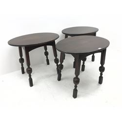 Three oval bog oak bar tables, square supports with cup and cover detailing