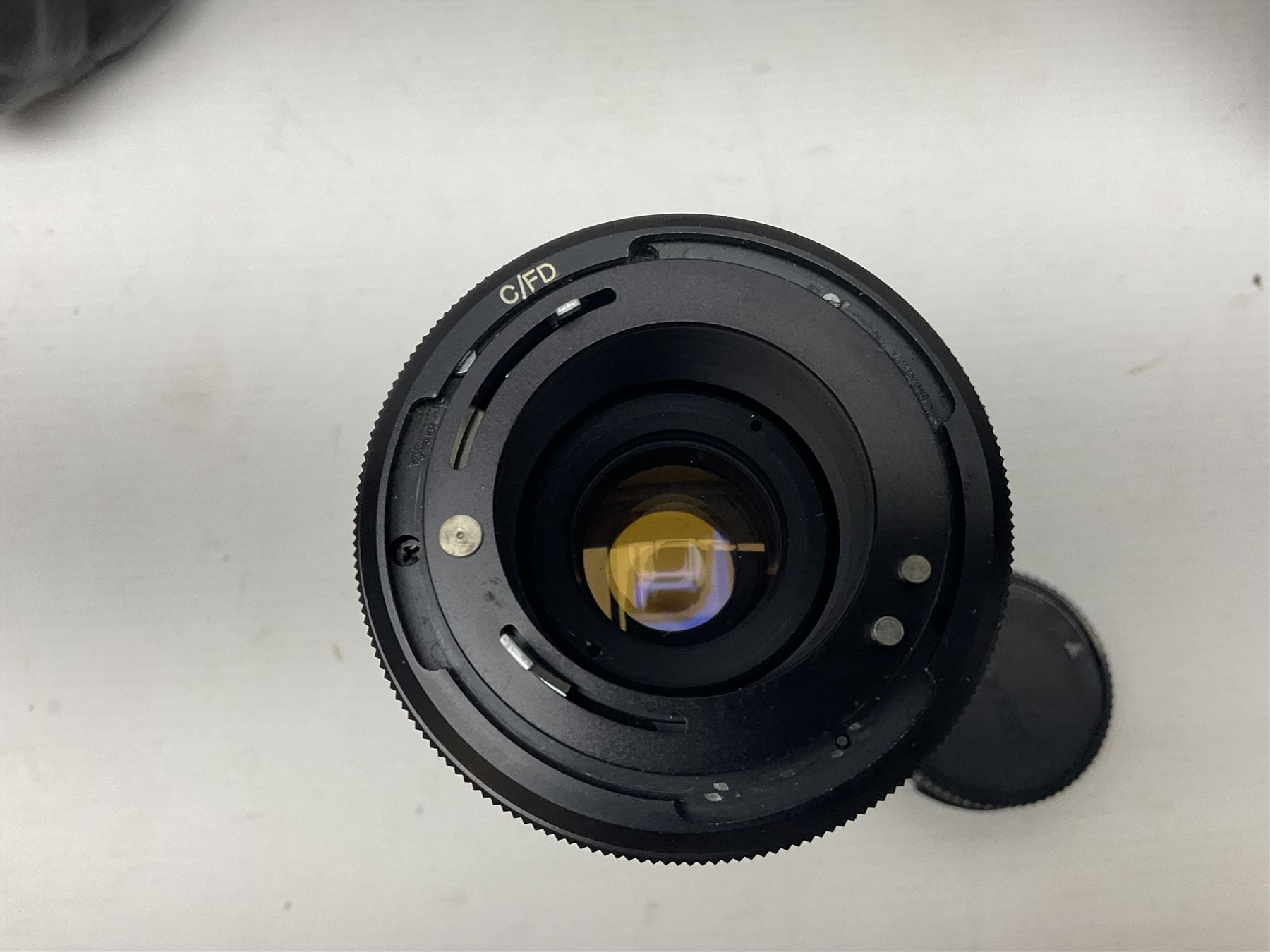 Canon A1 35mm camera body serial no 741264, with 'Tokina AT-X 28-85mm 1:3.5-4.5' lens serial no 821679, 'Canon FD 50mm 1:1.8mm' lens and other camera equipment 