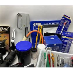 Vintage and later cameras, lenses, accessories and darkroom equipment including Zenit 12XP camera, Praktica BX20 camera fitted with 'Sigma Zoom Master 1:3.5-4.5 f=35-70mm' lens, Praktica LLC camera fitted with 'Carl Zeiss Jena Pancolar 1.8/50' lens, Canon Zoom Lens 'EF 100-300mm 1:5.6', various Jessop and other makers darkroom items including safelight (Red), universal duo tank, multi-mask enlarging easel etc, in three boxes
