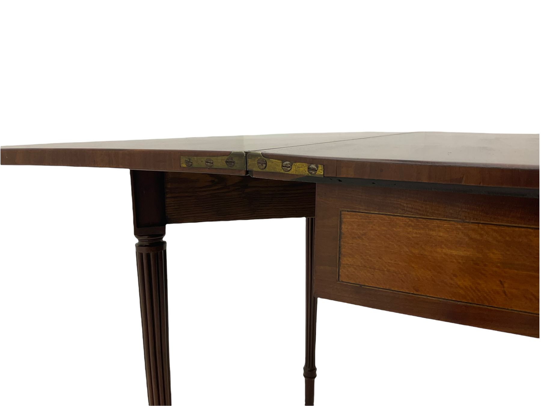 Early 19th century tea table, rectangular fold-over top with rounded corners, the frieze and sides inlaid with satinwood panels, double gate-leg action base, on reeded supports 