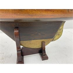 Early 20th century large pond yacht with mahogany hull, stained pine keel with brass rudder, simulated deck hatches and brass fittings, rigged as a staysail schooner (?) with four sails L117cm H148cm; loose mounted on stained pine stand