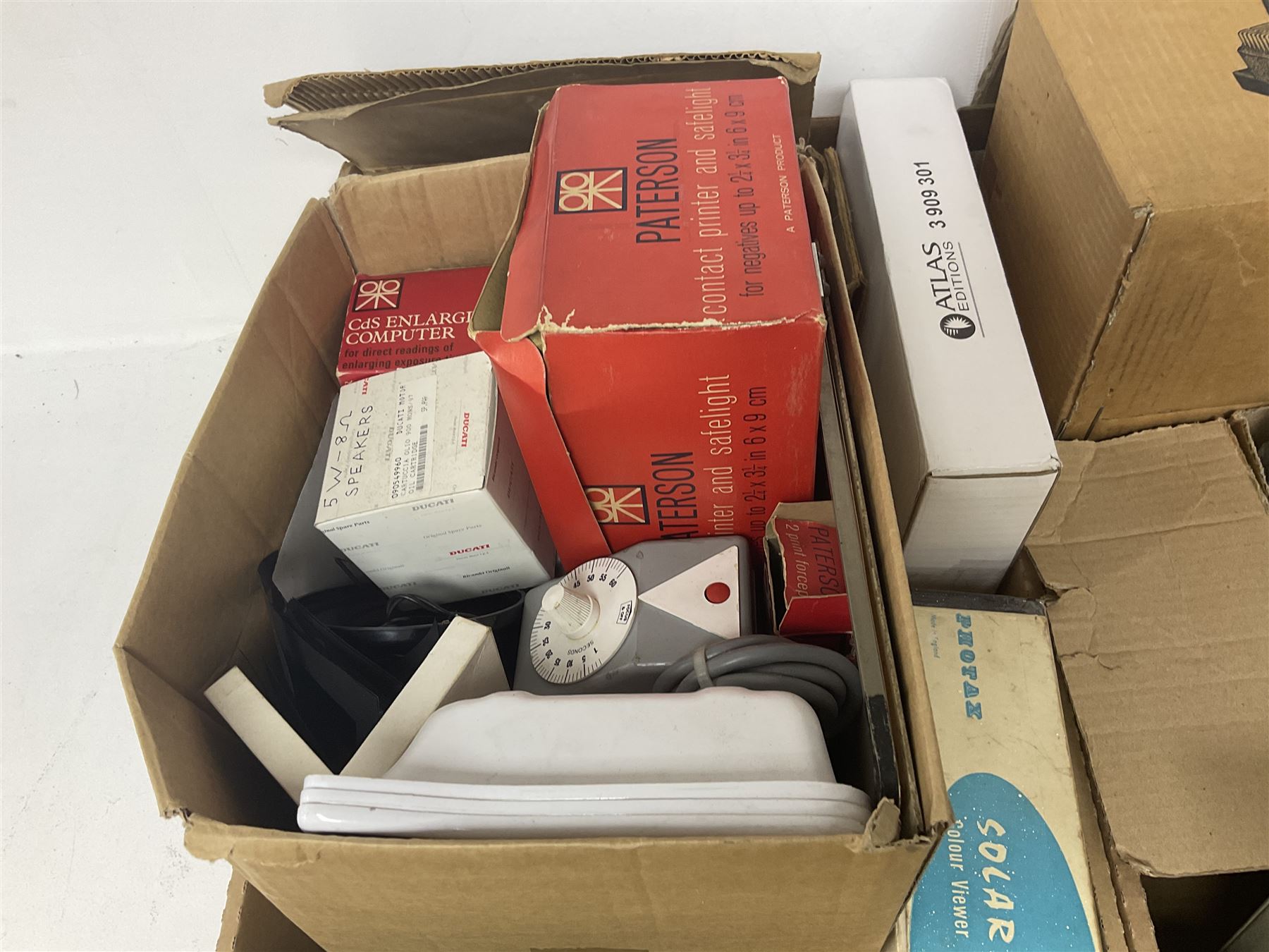 Large collection of projectors and equipment, to include Alphaxia Gnome projector, Kodak Brownie projector, slide containers, projector screen, etc, in six boxes