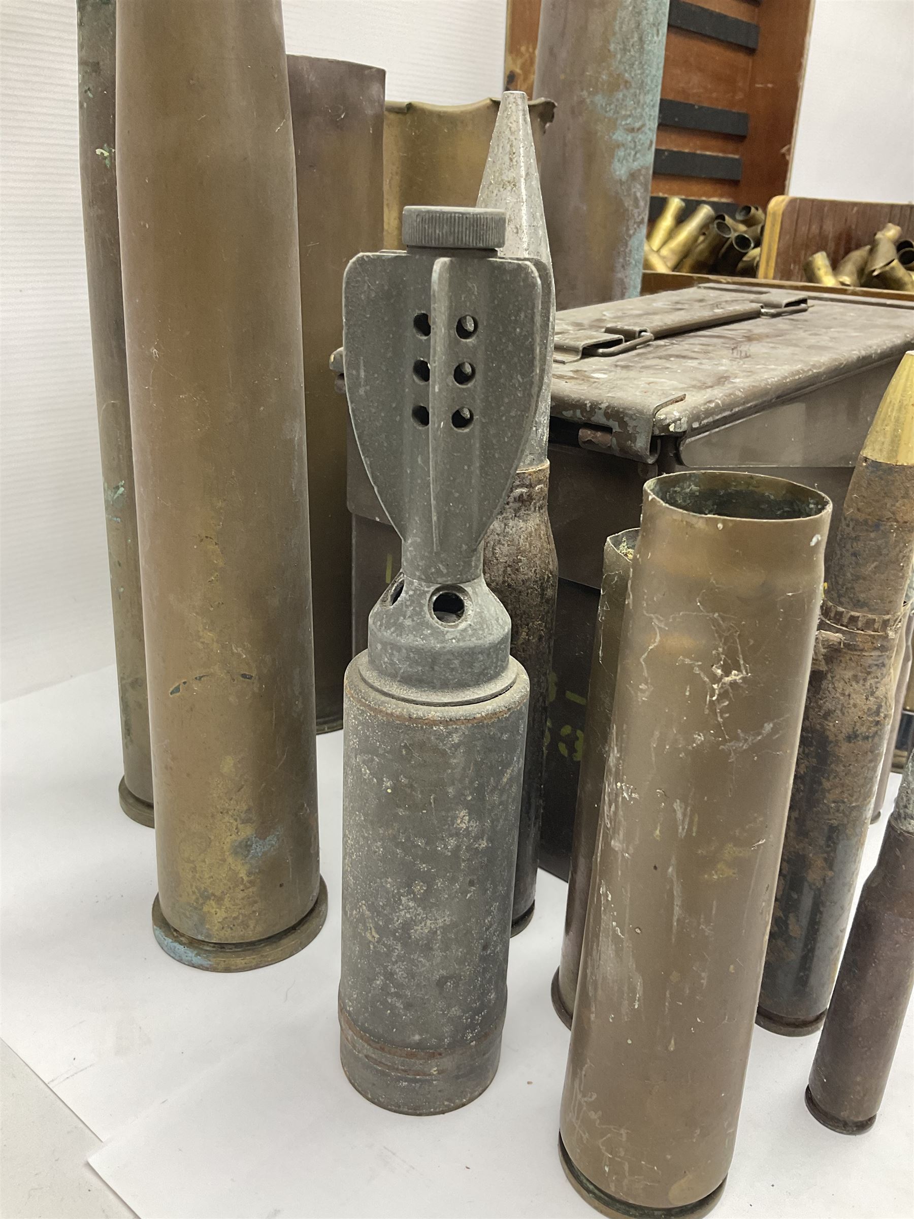 Large collection of shell and bullet casings, including a trench art example, together with a metal cartage case and wooden case