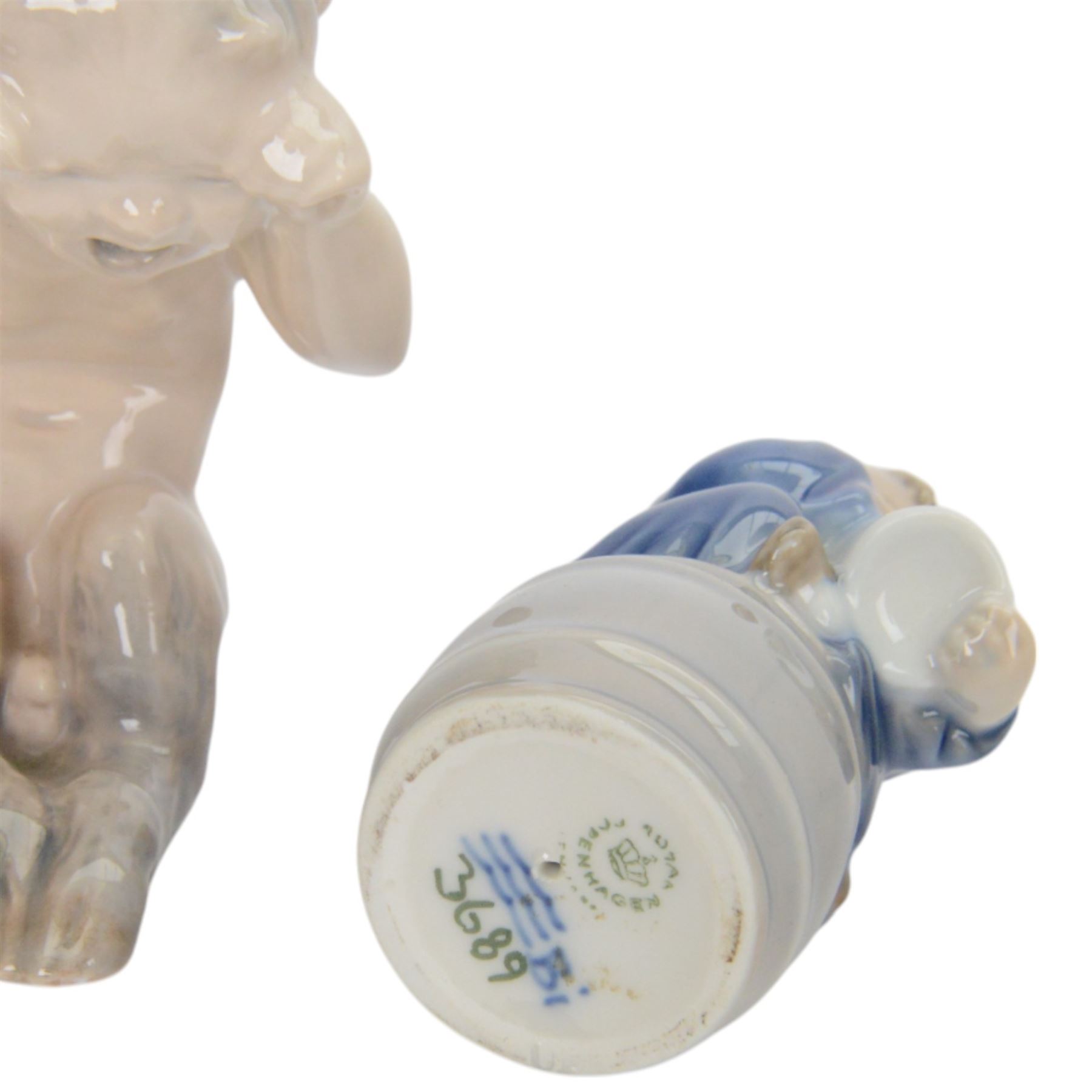 Six Royal Copenhagen figures, including Boy with Horn no 3689, Seated Fanoe Girl No.1315, The Sandman no. 1129 etc