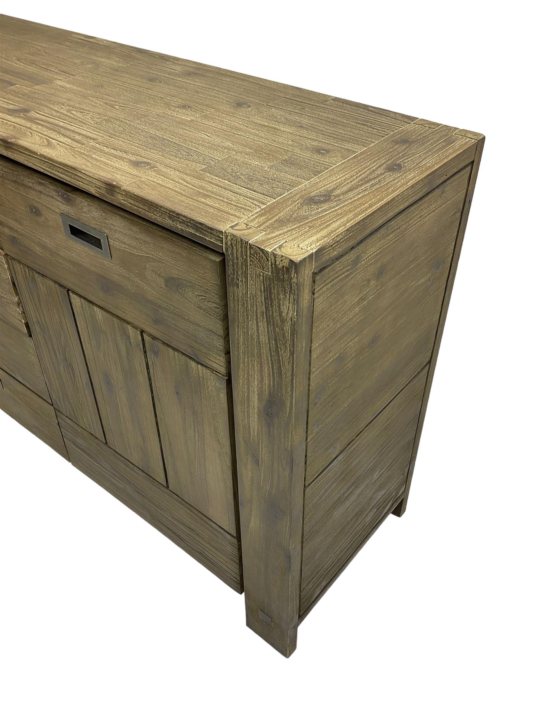 Contemporary hardwood sideboard, fitted with four drawers flanked by two cupboards, each with recessed metal handles