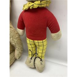 Deans Rag Book Mickey Mouse soft toy, circa 1930's, black velveteen head and body, with cream face and hands, red shorts and yellow felt shoes with leather soles, marked Reg. No. 750811 to neck H20cm; mid-20th century woodwool filled plush covered teddy bear with revolving head, applied eyes, vertically stitched nose and mouth and jointed limbs H52cm; soft toy figure of Rupert Bear; and Japanese clockwork tin-plate and plush covered mechanical toy of a gnome riding a donkey (4)