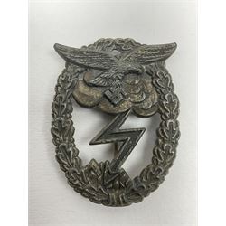 Two WW2 German Luftwaffe Ground Assault/Combat badges - one with flat pin and maker's mark M.u.K.; the other unmarked with round pin (2)