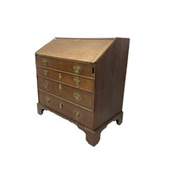 George III oak bureau, fall-front enclosing fitted interior and secret compartment, over three graduating drawers, on bracket feet