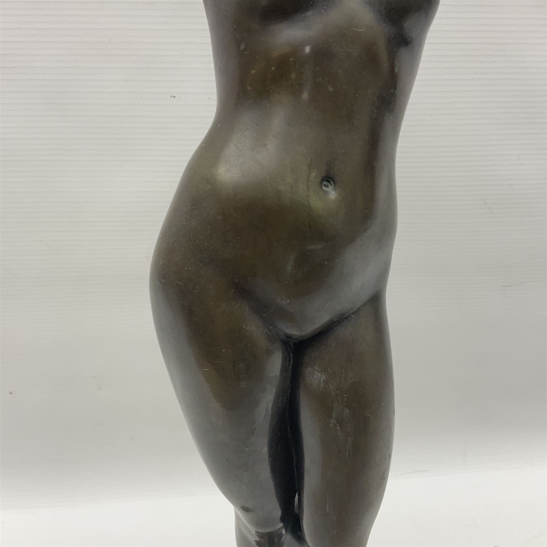After Eugen Schlipf, Fanfair, bronzed female figure playing two horns, upon a circular marble plinth, H57cm