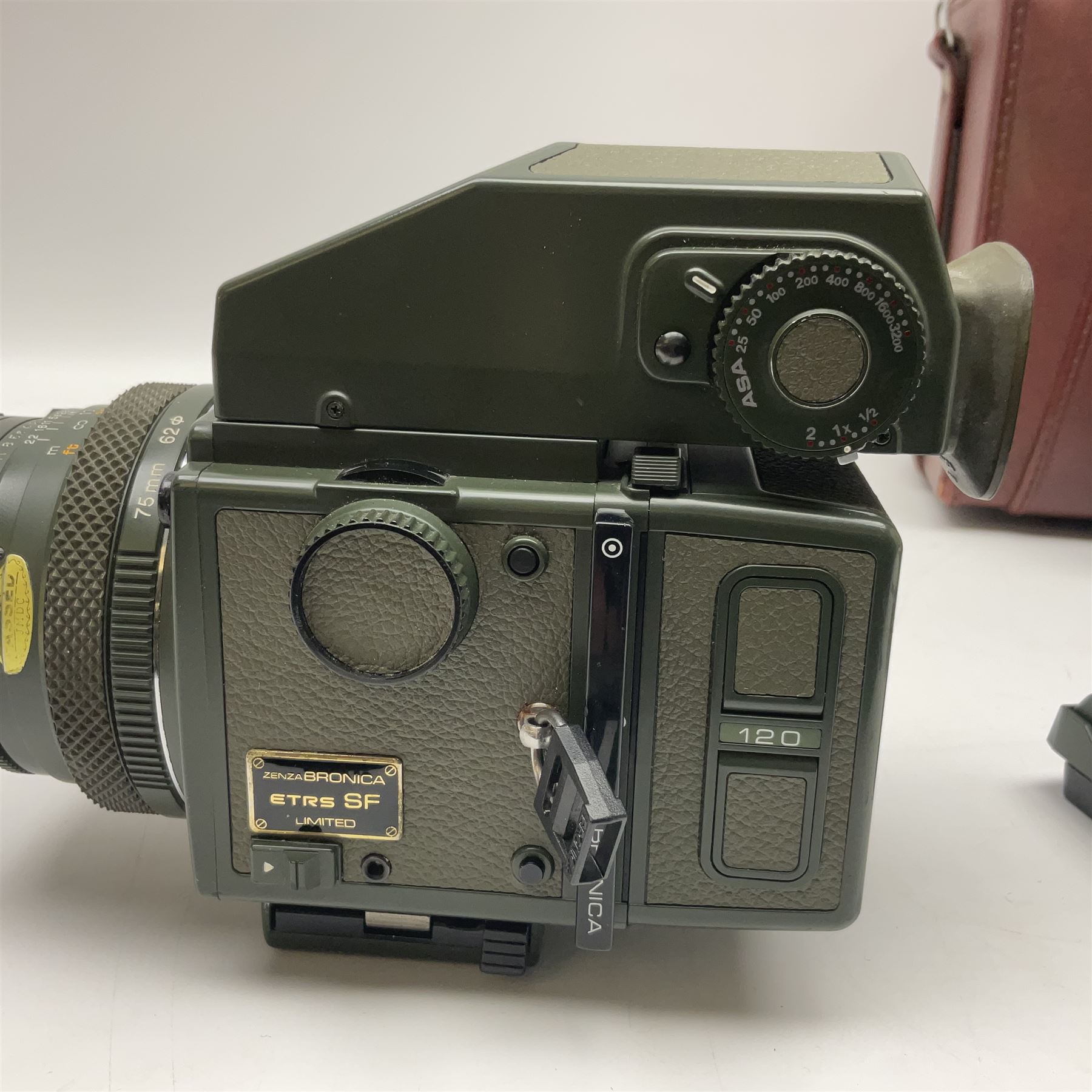 Zenza Bronica ETRS camera body, safari edition, serial no. 7100811, with 'Zenza Bronica Zenzanon EII 1:2.8 f=75mm' lens, serial no. 7908591, film magazine back, safari, serial no. 8100564, AE-ii metering head, safari, serial no. 617024, etc, all in leather case