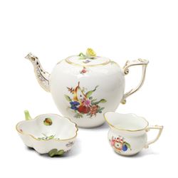 Herend porcelain Tete a Tete decorated with sprays of Spring flowers and scattered leaves etc comprising cabaret tray, two cups and saucers, tea pot, leaf shape bowl and milk jug, some pieces marked Pek Jozsefine