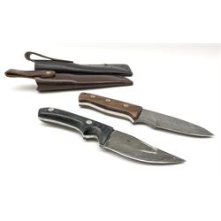 Perkin hunting knife with 10.5cm damascus blade stamped PERKIN and metal studded hardwood handle L20.5cm; and another similar unmarked hunting knife; each in leather sheath (2)