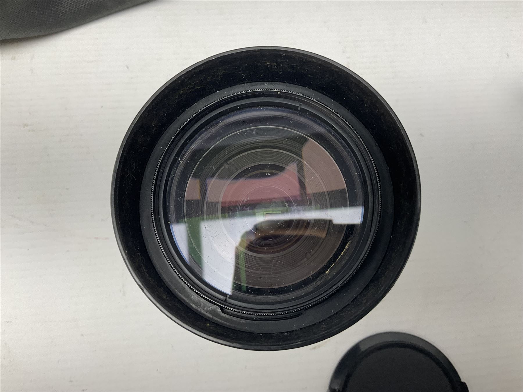 Canon A1 camera body, serial no 775843, together with 'Canon Lens FD 200mm 1:4 lens' serial no 24432, together with Semi Minolta folding camera, Canon 'Zoom FD 35-105mm 1:3.5-4.5' lens, Canon 'Macro Focusing Zoom 72mm Hanimex HMC 28-200mm' lens and other camera equipment  