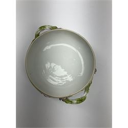 Continental Meissen style tureen and cover, with osier moulded borders, decorated with birds and insects, twin green branch handles and the cover surmounted with a floral finial, spurious mark beneath, H12cm  
