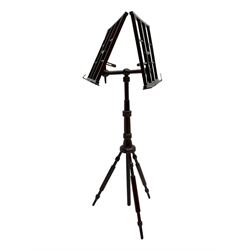 Early 20th century stained beech duet music stand, opposing twin music rests with swivel action, raised on turned column with bobbin turned tripod base