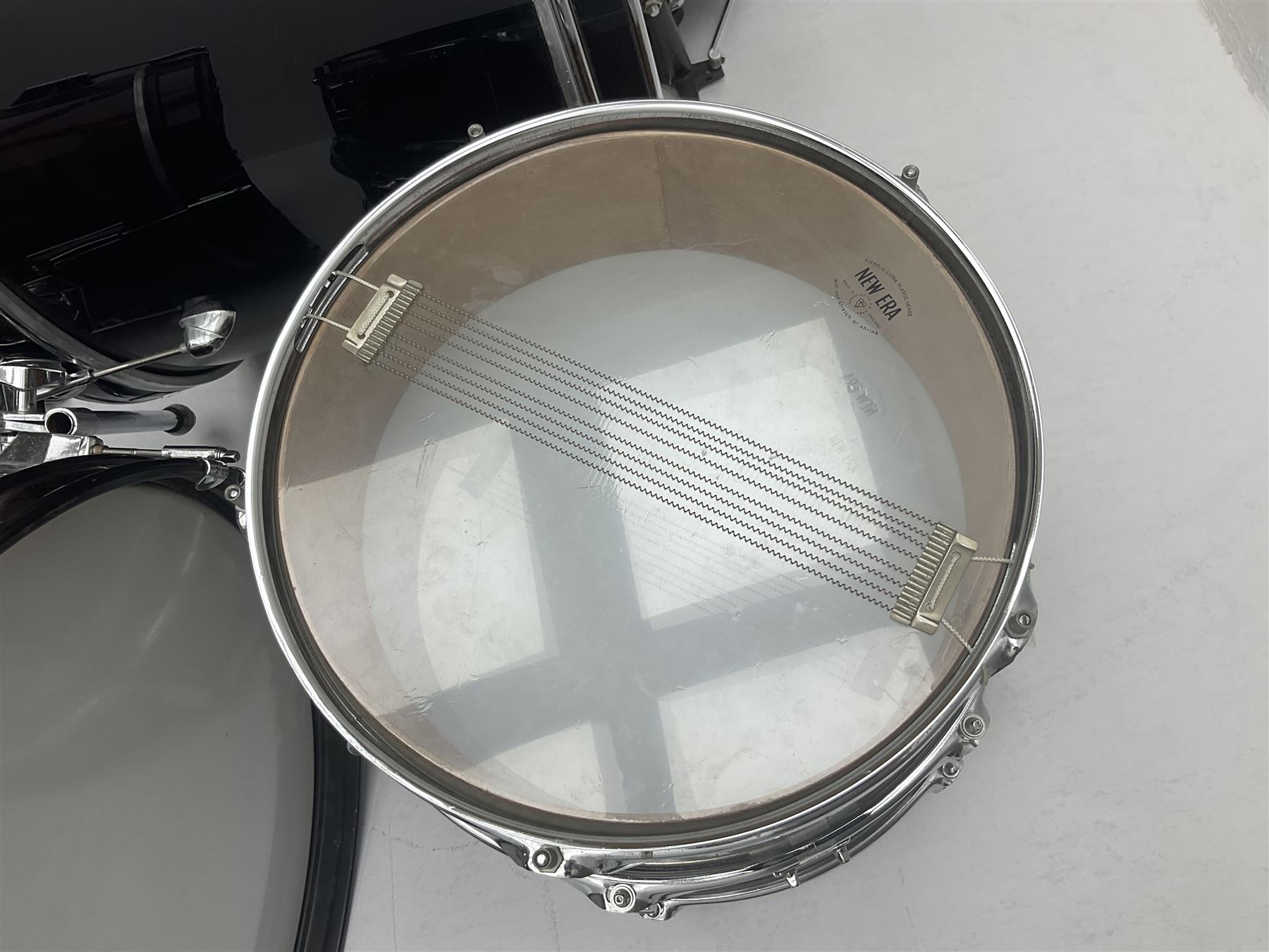 Rockburn eight-piece black drum kit with bass drum, floor tom and five other toms and snare drum; together with two other snare drums; Haosen bass drum; four cymbals; various stands, foot pedals, stool, tri-angle, drum sticks etc