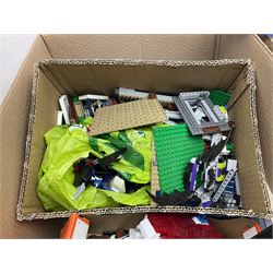 Very large collection of Lego, predominantly loose but some part constructed models, including Lego City, Lego Technic, Chima, Arctic 5, train set, mobile crane etc; together with numerous instruction booklets and some empty boxes; contained in two large cardboard boxes with gross weight of over 24kgs