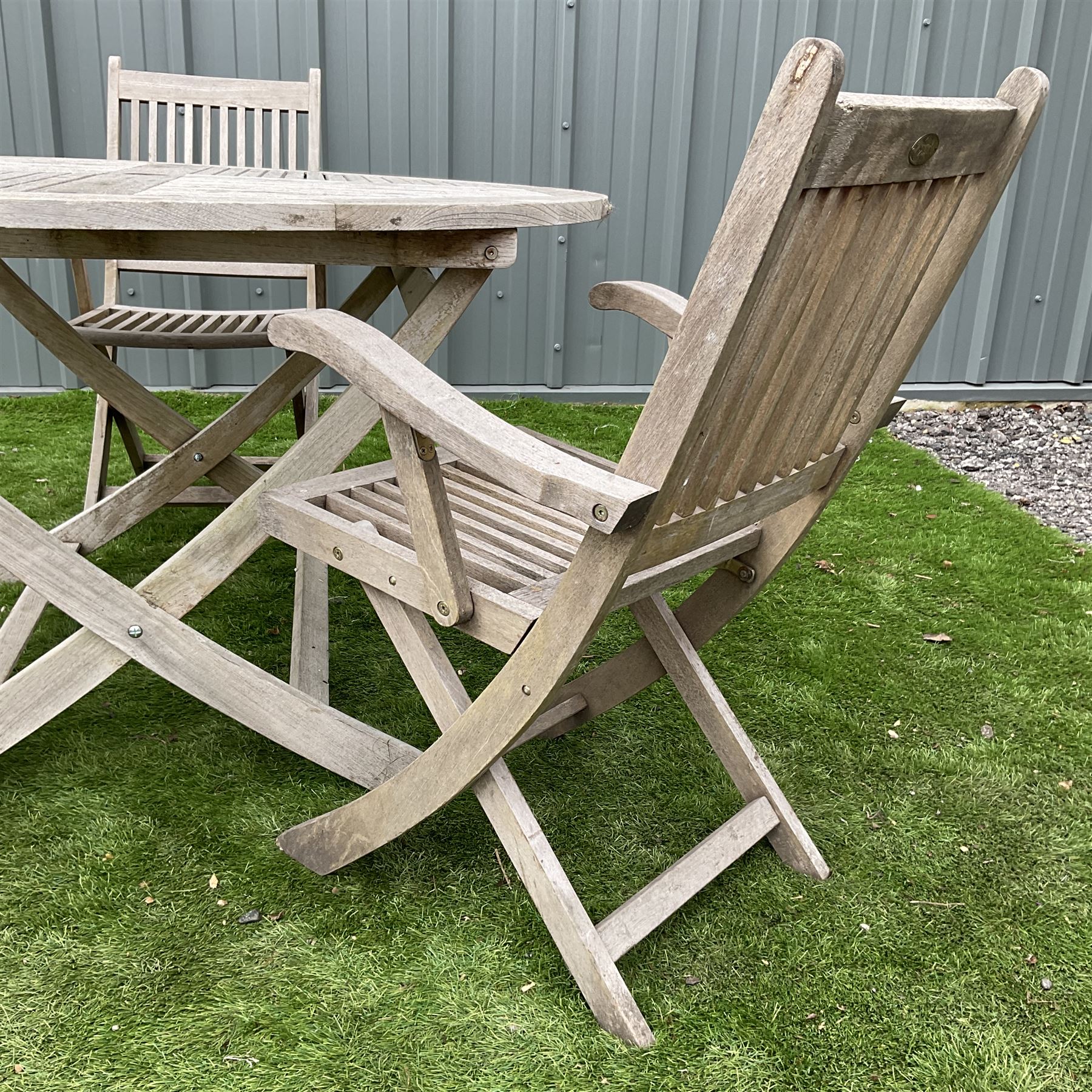 Cannock Gates teak circular garden table and three folding chairs  - THIS LOT IS TO BE COLLECTED BY APPOINTMENT FROM DUGGLEBY STORAGE, GREAT HILL, EASTFIELD, SCARBOROUGH, YO11 3TX