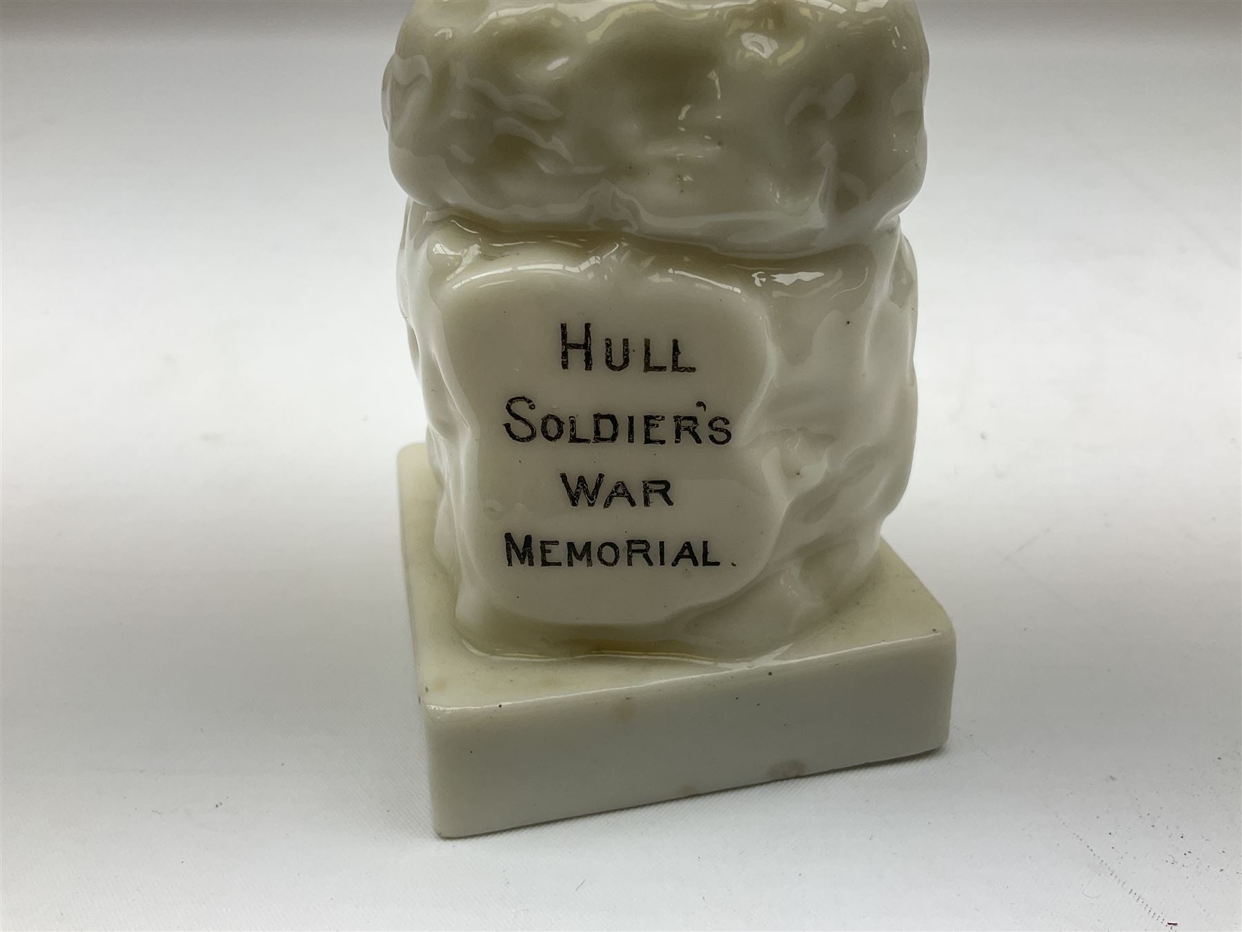 Royal Dux figure of a saluting soldier and Willow Art Crested ware Hull soldiers war memorial c1903 late South African war, tallest H19cm