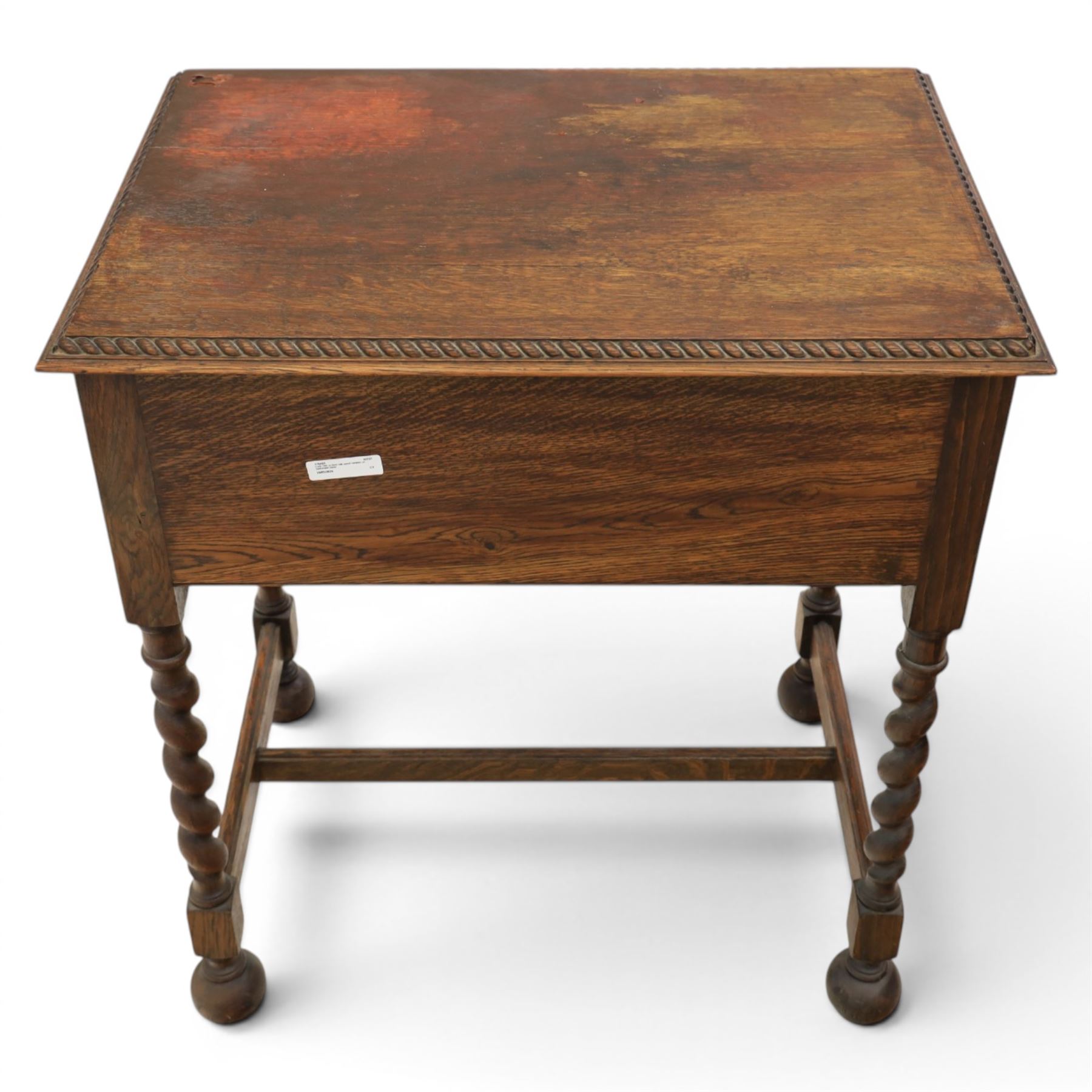 Early 20th century oak cased canteen on barleytwist stand, hinged top with fitted baized lined interior, above a drawer fitted for cutlery