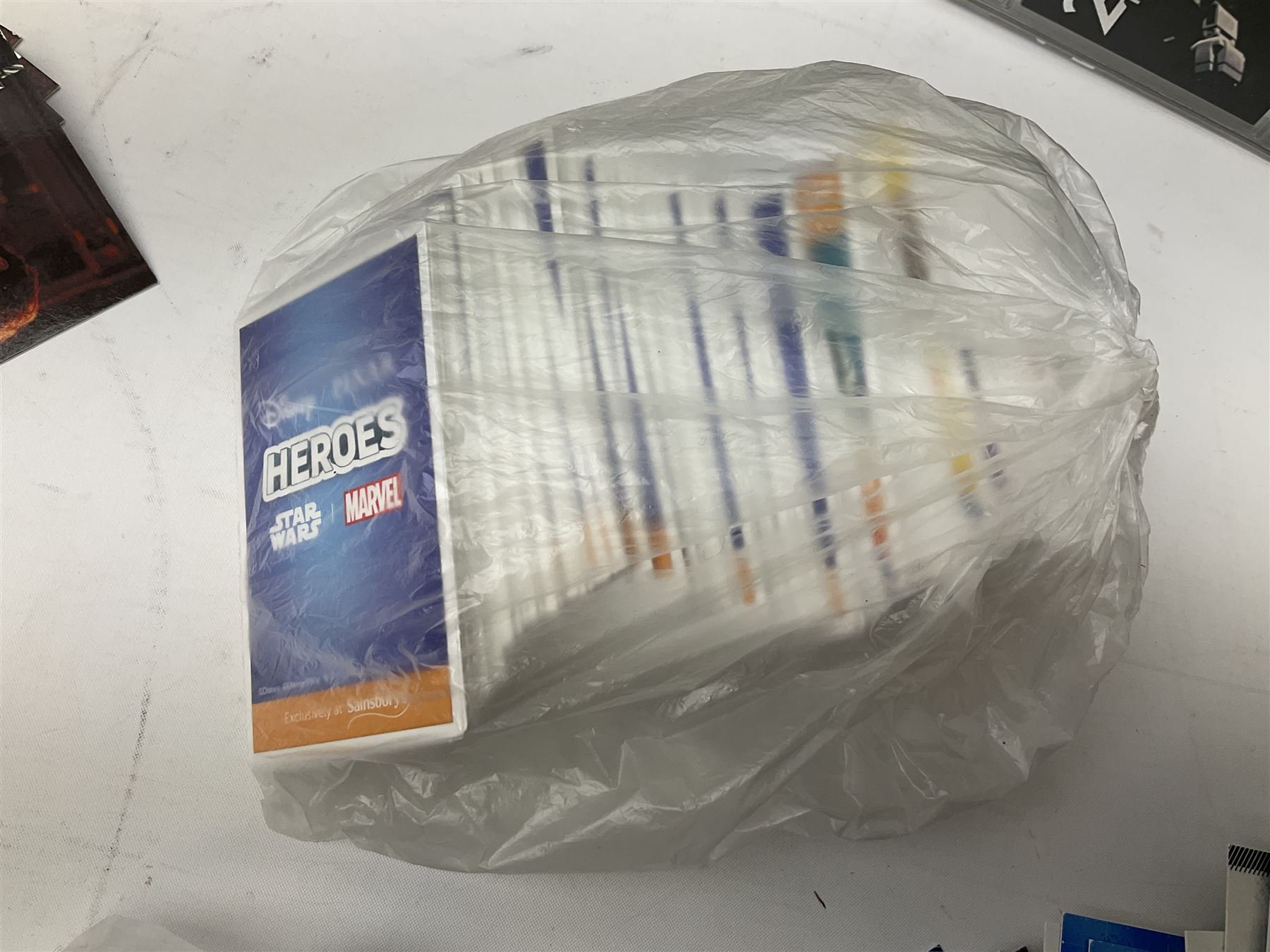 Collection of Star Trek collectors cards to include ‘Alternate Universe’ and ‘Q Continuum’ series, Star Wars cards etc housed in white album
and Harry Potter, Disney and other loose examples